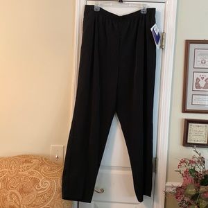 Black pants with side pockets and a stretchy waist.
